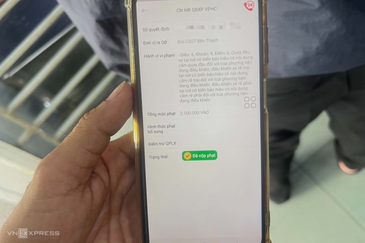 1787737663-6f15516aa6-wm1-wm1-3-jpeg-3984-3549-4322-width740height494 Người vi phạm nhận được thông báo sau khi đã nộp phạt. Ảnh: Phạm Hải