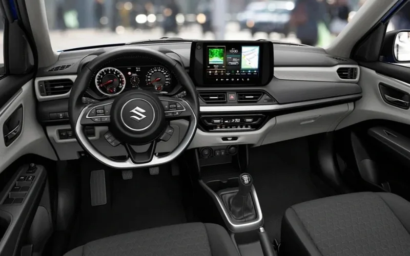 Nội thất của Swift 2025 chủ yếu tập trung vào việc thay đổi cụm điều khiển điều hòa và màn hình giải trí trung tâm dạng nổi kích thước 9,7 inch